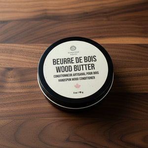 Container of 'Beurre de Bois Wood Butter' on walnut counter